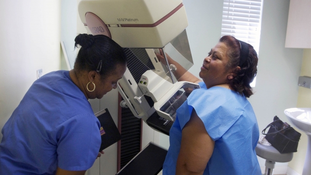 Woman undergoes a mammogram
