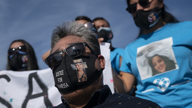 Slain Army Spc. Vanessa Guillen's father wears a face mask with an image of Vanessa and the words "JUSTICE FOR VANESSA"