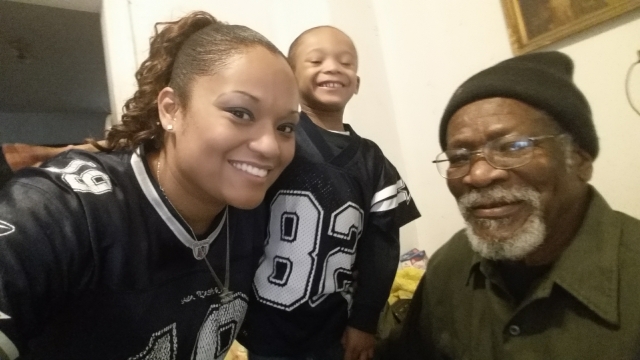 Mikki Frison poses with her son and late grandfather