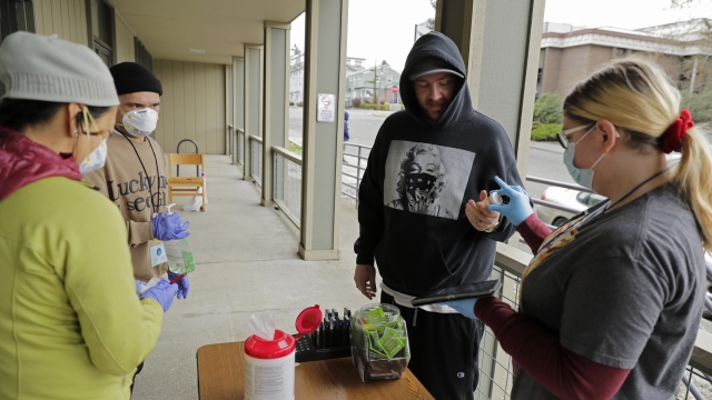 A patient picks up medication for opioid addiction at a clinic in Olympia, Wash.