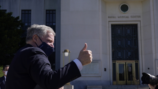 White House Chief of Staff Mark Meadows flashes thumbs up following medical briefing with reporters at Walter Reed