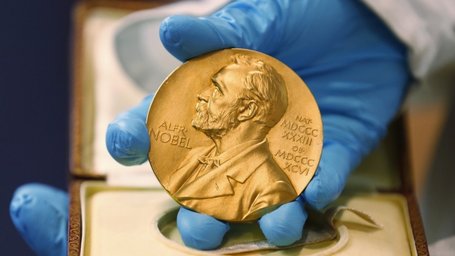 A Nobel prize being shown in Colombia