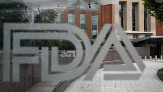 FDA logo shown on a bus stop in front of their headquarters