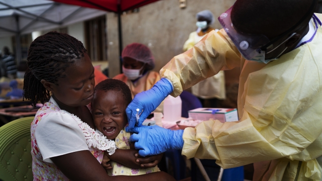 2019: A child is vaccinated  against Ebola in Beni, Congo DRC.