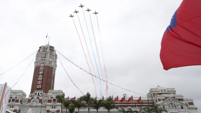 Jets fly over presidential office in Taipei in National Day celebrations on Oct. 10.