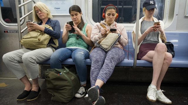 Women looking at their phones