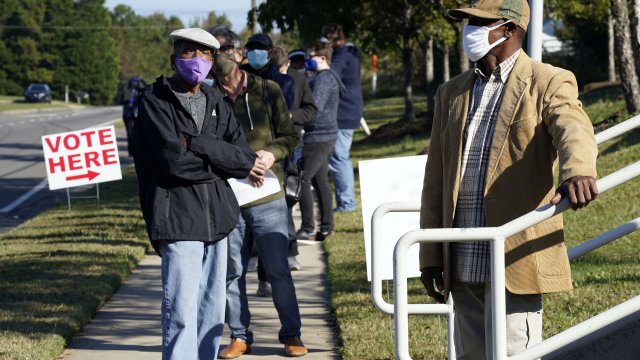 Early voters line up to cast their ballots in North Carolina.