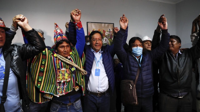Luis Arce celebrates Bolivian presidential win.