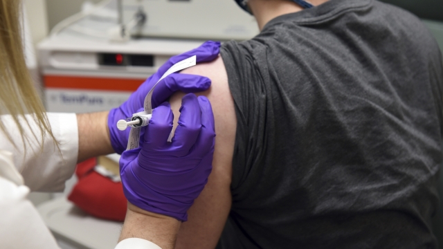 A patient receives a vaccine.