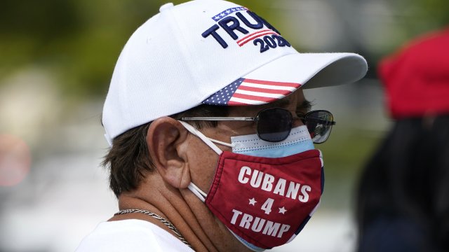A Cuban man at campaign rally featuring Vice President Mike Pence at the Cuban Memorial Monument, Oct. 15, 2020, in Miami.