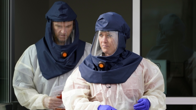 Health workers in protective clothing