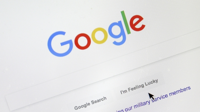 A cursor moves over Google's search engine page