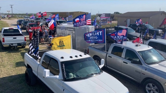 Pickup trucks with Trump flags