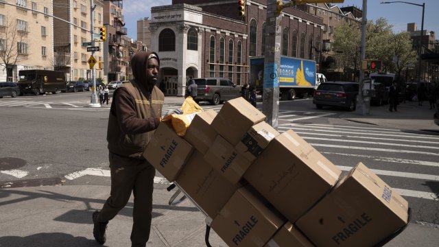 A UPS driver delivers packages during the coronavirus pandemic