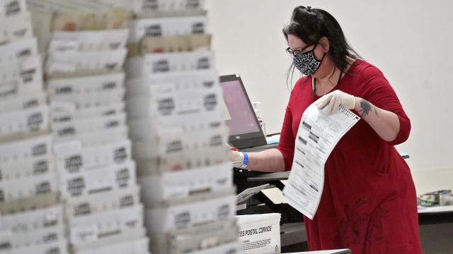Arizona elections officials continue to count ballots inside the Maricopa County Recorder's Office on Nov. 6, 2020.