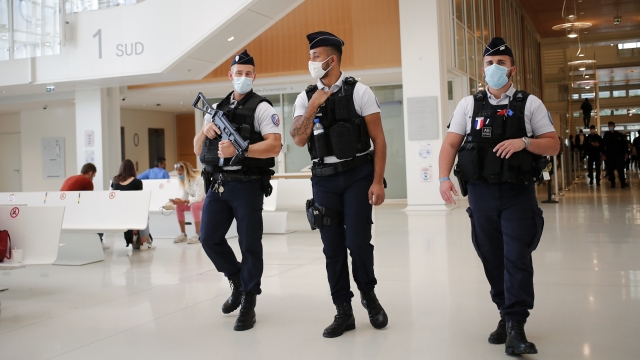 French police officers in a Paris courthouse