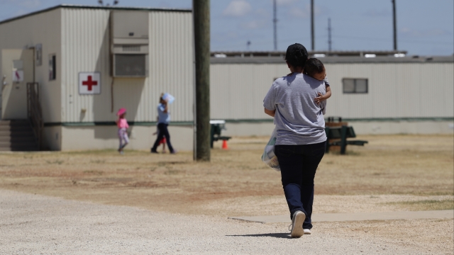 Immigrants seeking asylum walk at the ICE South Texas Family Residential Center, in Dilley, Texas in August 2019.