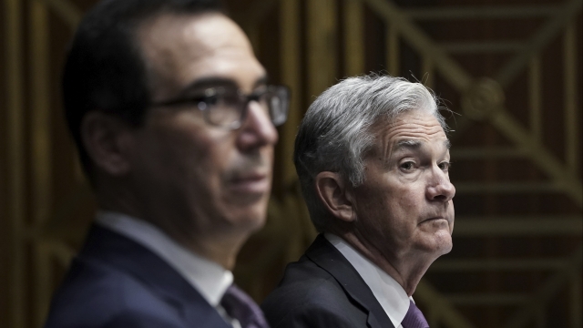 Steven Mnuchin and Jerome Powell sit together in September 2020 Senate hearing