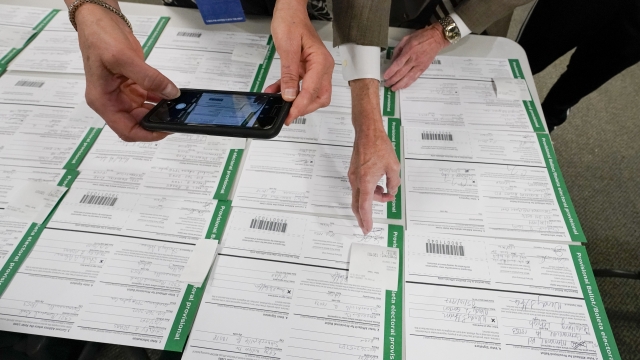 A canvas observe photographs ballots in Allentown, Pennsylvania