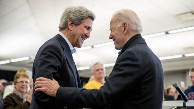 President-elect Joe Biden shakes hands with former Secretary of State John Kerry