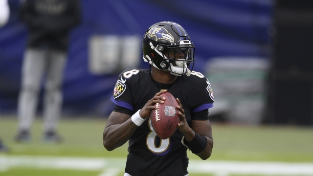 Baltimore Ravens quarterback Lamar Jackson in action during an NFL game against the Tennessee Titans.