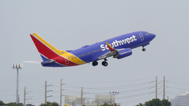 A Southwest Airlines Boeing 737-7H4 takes off.