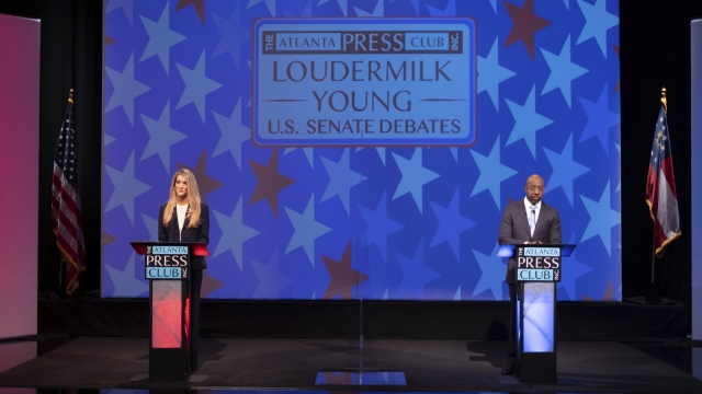 Georgia Sen. Kelly Loeffler and Democratic challenger Raphael Warnock appear during a debate