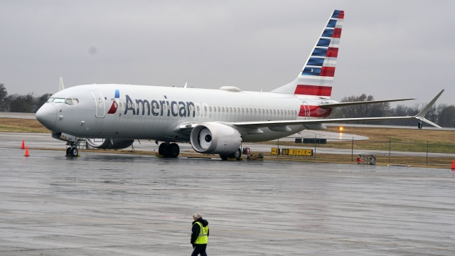 An American Airlines Boeing 737 Max jet plane parked at a maintenance facility