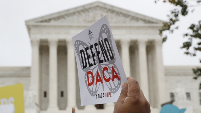 People rally outside the Supreme Court for the Deferred Action for Childhood Arrivals