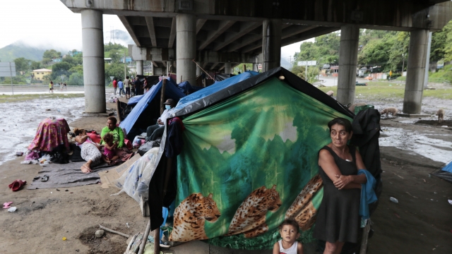 Hurricane victims take refuge under a bridge in San Pedro Sula, Honduras