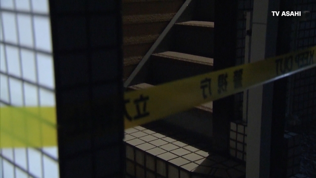 Yellow caution tape is marks off a crime scene in Japan.