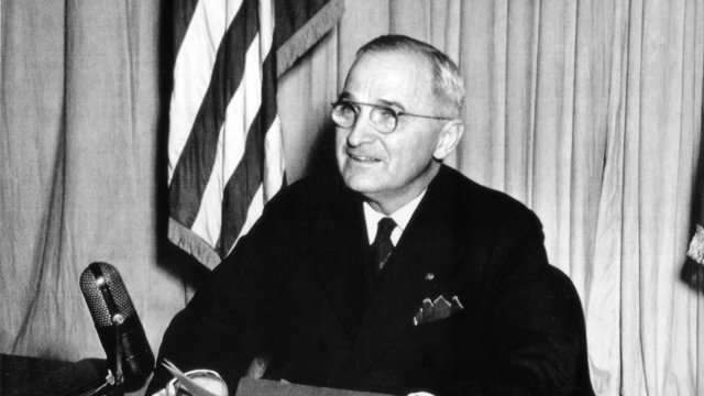 Truman announcing the Allied armies won an unconditional surrender from German forces on all fronts in 1945.