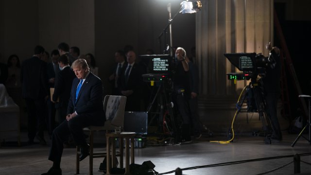 President Donald Trump waits for a segment to start.
