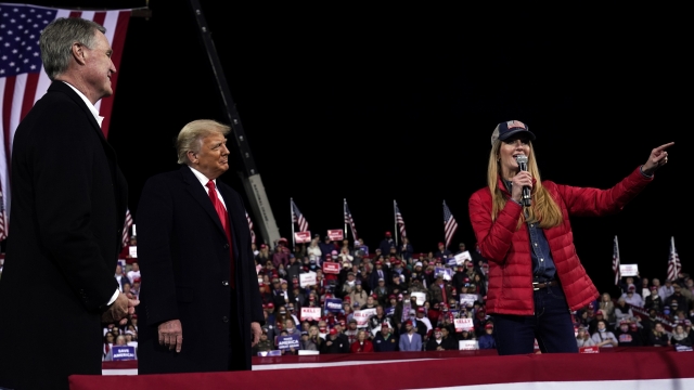President Donald Trump appears at a rally with Georgia Senators Kelly Loeffler and David Perdue
