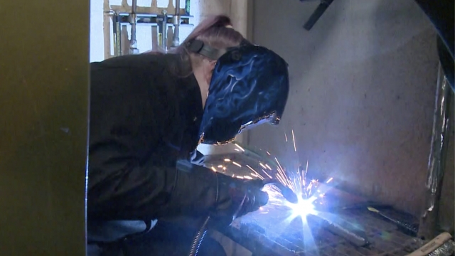 Woman learns how to weld