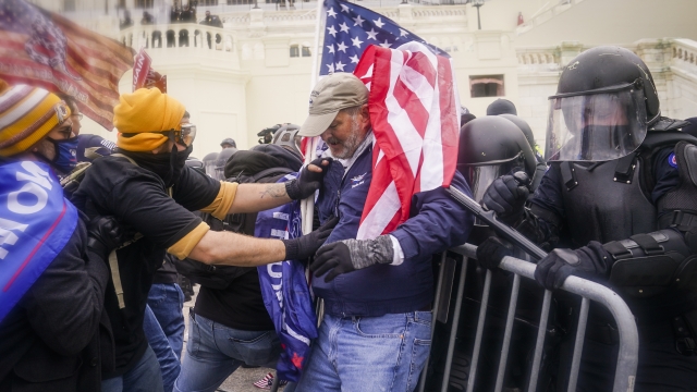 Rioters clash with authorities at the Capitol