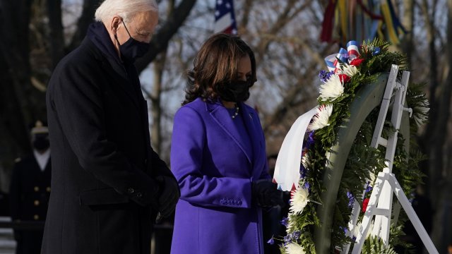 President Joe Biden and Vice President Kamala Harris take part in a wreath laying ceremony at the Tomb of the Unknown Soldier