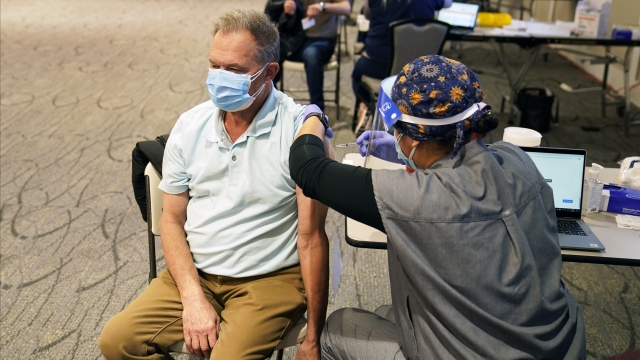 A Minnesota man receives a vaccination