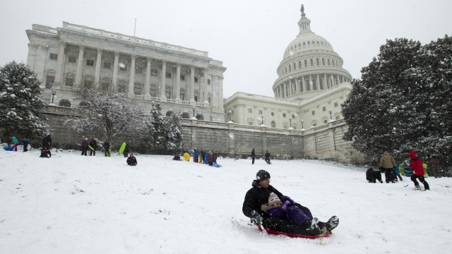 Families sled by Capitol
