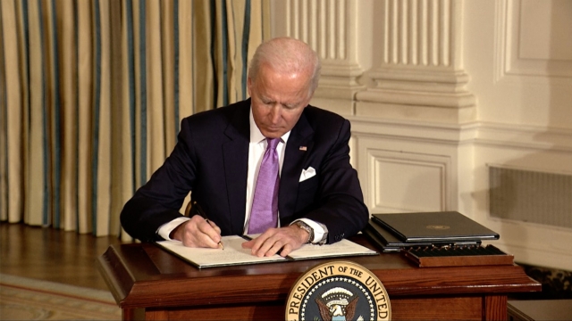 President Biden signs the executive memorandum against anti-Asian hate.
