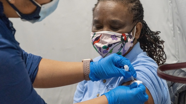 Someone receives the coronavirus vaccine at a pop-up COVID-19 vaccination site