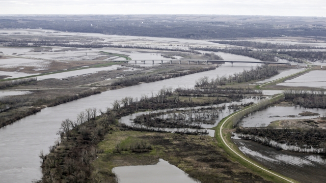 The highway 34 bridge spans the Missouri River and its flooded banks between La Platte, Nebraska and Glenwood, Iowa, in 2019.