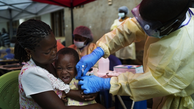 A child is vaccinated against Ebola in Beni, Congo.