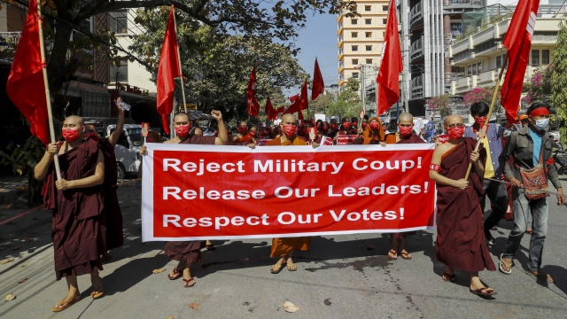 Buddhist monks lead a protest march against the military coup in Mandalay, Myanmar.