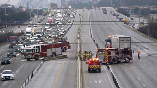 Highway sits closed as emergency crews finish cleaning following accidents caused by ice and low temperatures in Texas.
