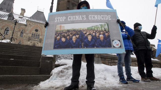 Protesters gather outside the Parliament buildings in Ottawa, Ontario, Monday, Feb. 22, 2021.