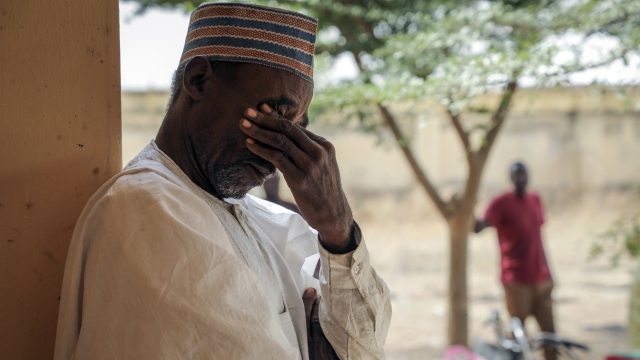 A father whose four daughters are among more than 300 girls who were abducted by gunmen