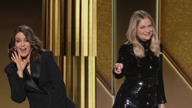 Hosts Tina Fey, left, from New York, and Amy Poehler, from Beverly Hills, Calif., speak at the Golden Globe Awards