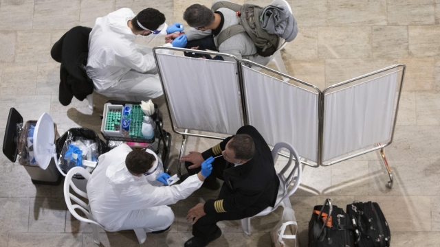 People are tested for COVID-19 at airport near Tel Aviv, Israel