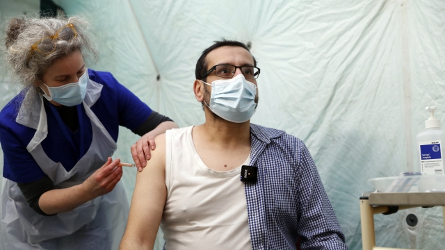 A doctor administers a dose of the AstraZeneca Covid-19 vaccine